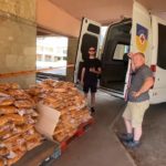 bread getting loaded into van